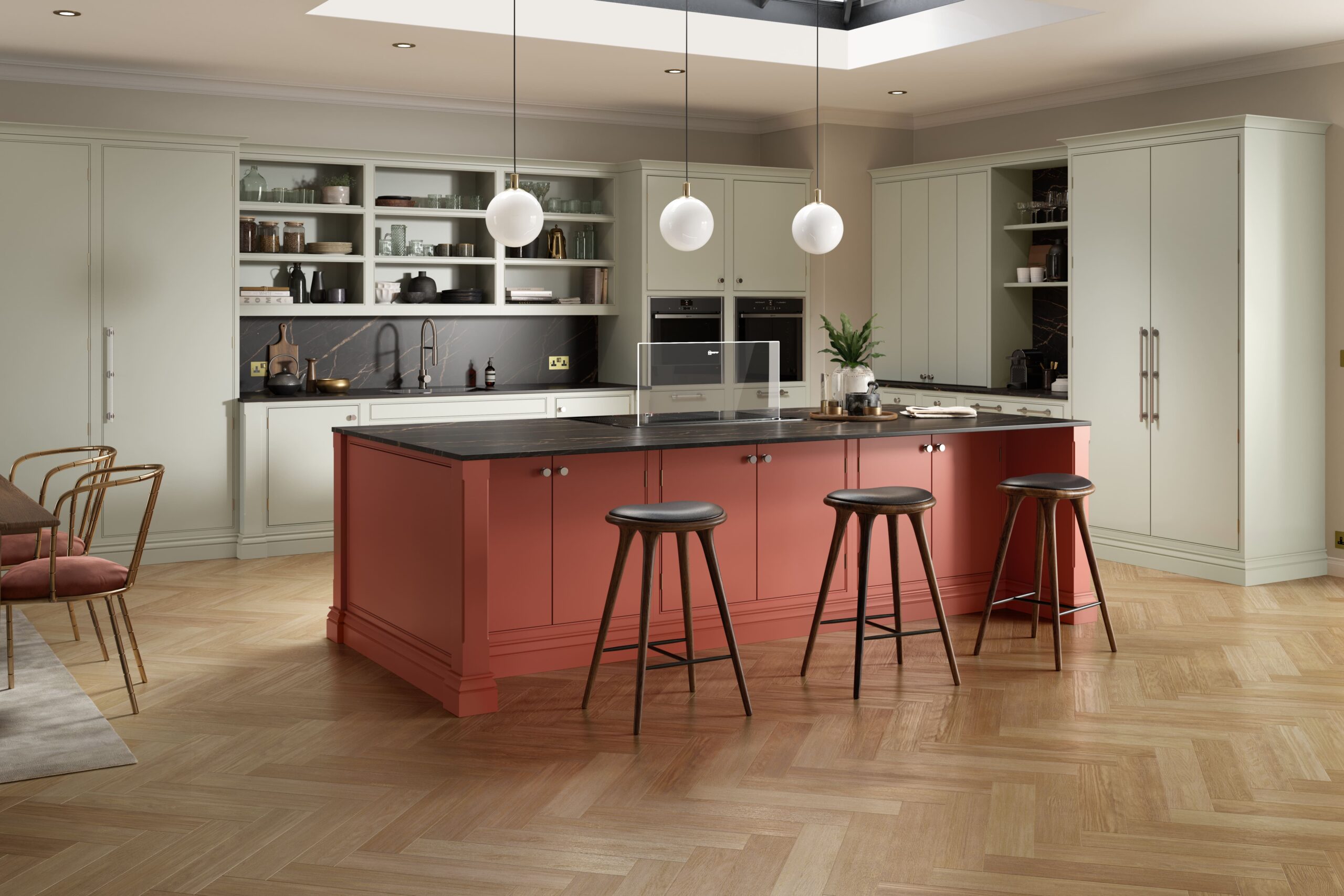 modern shaker kitchen with deep red island and cream cabinetry, luxury open plan kitchen with contrasting island, contemporary kitchen with herringbone flooring and pendant lighting