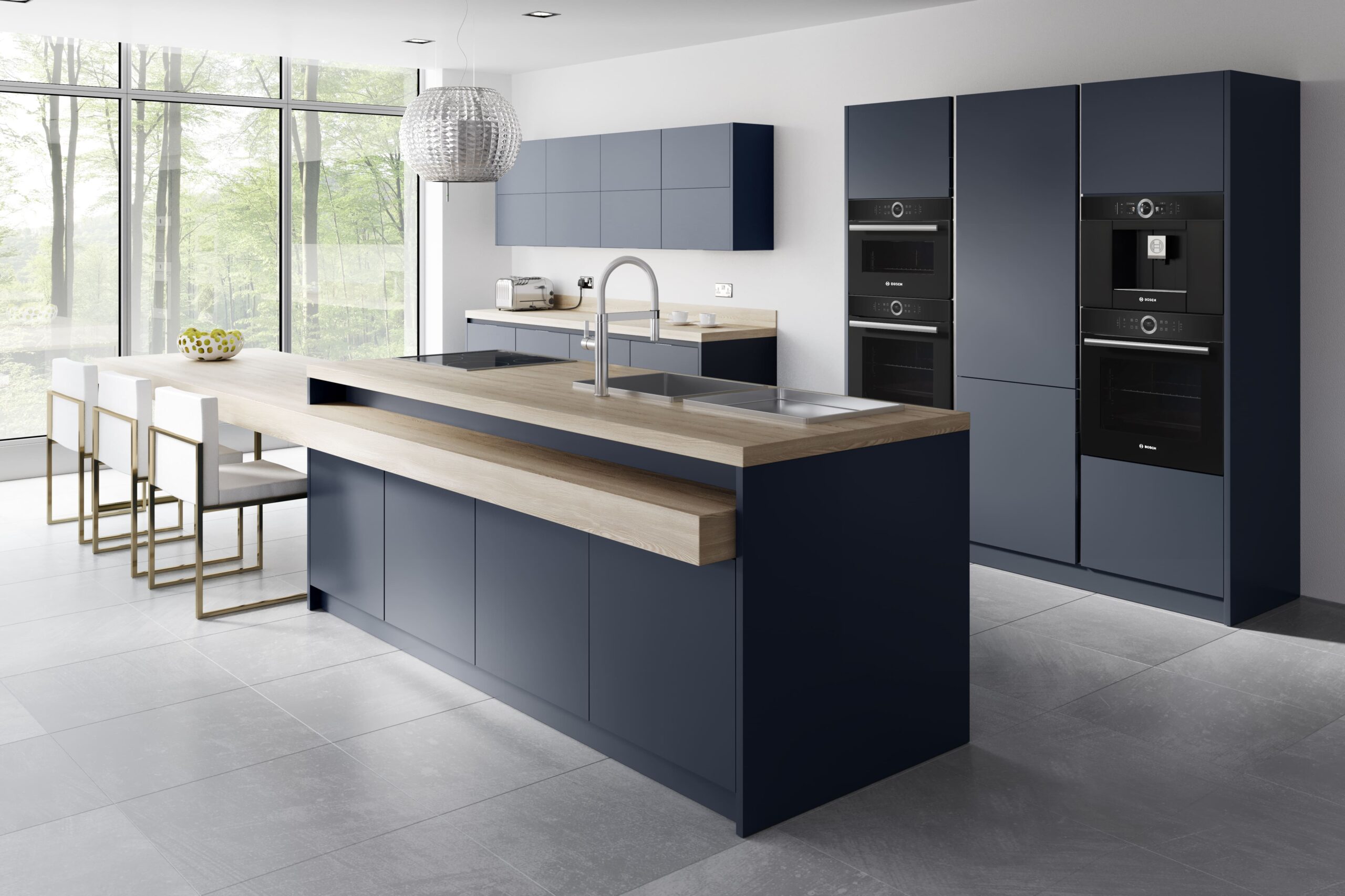 modern matt blue kitchen with wood veneer worktop, handleless kitchen cabinets with integrated appliances, contemporary kitchen with large island and breakfast bar